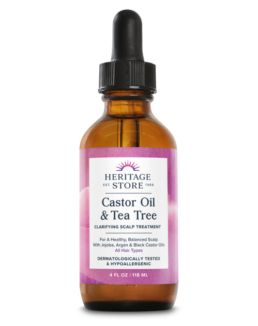 A brown glass dropper bottle labeled Daily Care Castor Oil & Tea Tree with nourishing oils, 4 fl oz.
