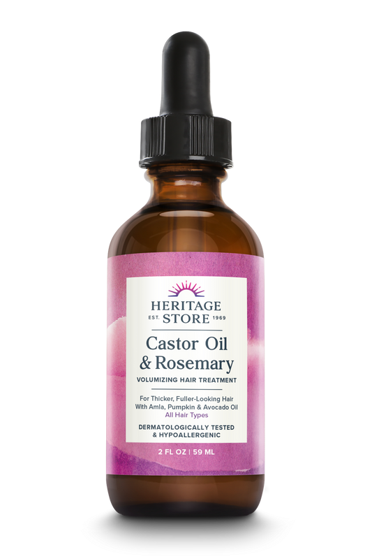 Amber bottle of Daily Care Castor Oil & Rosemary, an organic hair oil and scalp treatment for thicker hair, 2 fl oz.