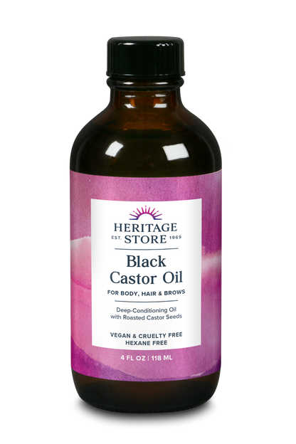 A 4 fl oz brown glass bottle of Daily Care Black Castor Oil for hair, with a pink label and black cap.
