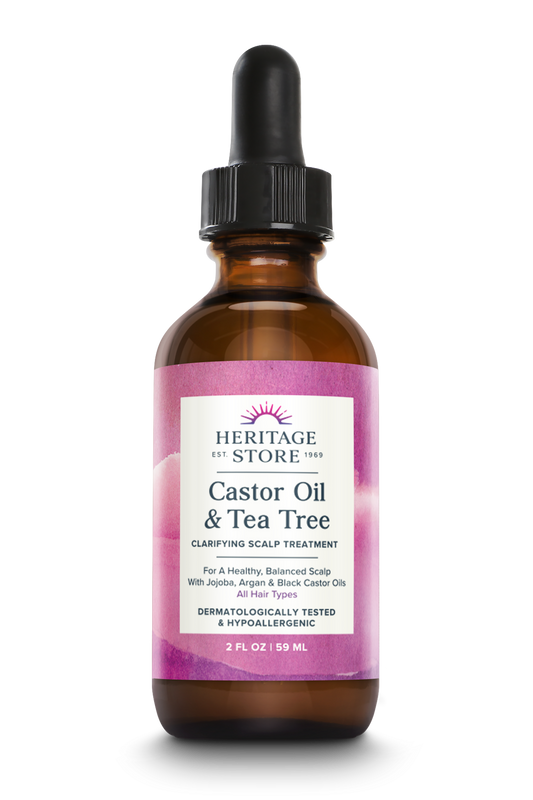 A brown dropper bottle labeled Daily Care Castor Oil & Tea Tree, clarifying scalp treatment, 2 fl oz size.