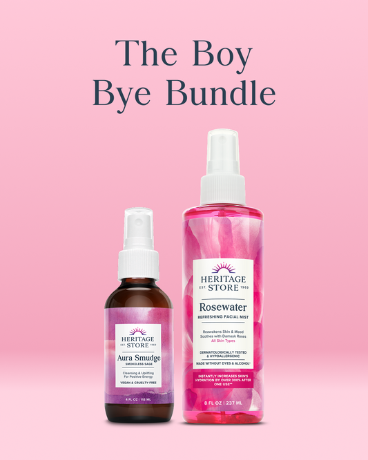The Boy Bye Bundle by Heritage Store: Aura Smudge and Rosewater Mist bottles on pink background.